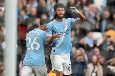 Manchester City 'den Matheus Nunes, 27 Eylül 2025 tarihinde Etihad Stadyumu' nda oynanan Premier League maçında 2-1 'lik galibiyetini kutluyor. 
