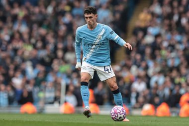 Manchester City 'den Phil Foden, 27 Eylül 2025' te Etihad Stadyumu 'nda oynanan Premier League maçında topu aldı. 