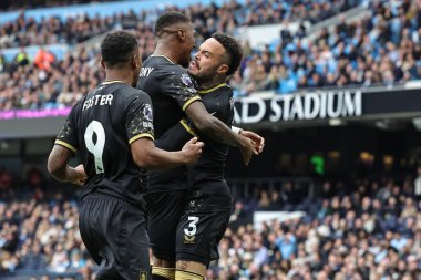 Burnley 'den Jaidon Anthony, 27 Eylül 2025' te Etihad Stadyumu 'nda Manchester City ile Burnley arasındaki Premier League maçında 1-1' lik galibiyetini kutluyor. 