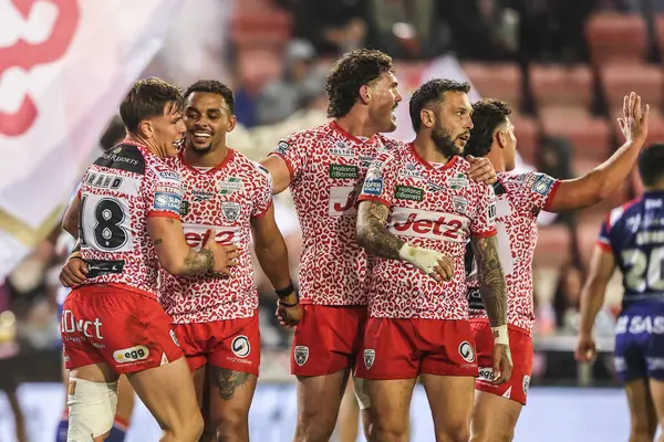 Keanan Brand of Leigh Leopards celebrates his try making it 4-0 during the Betfred Super League play-off Eliminator 1 match Leigh Leopards vs Wakefield Trinity at Progress With Unity Stadium, Leigh, United Kingdom, 26th September 2025