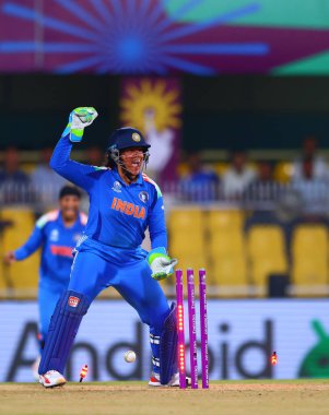 Wicket keeper Richa Ghosh of India celebrating the wicket of Chamari Athapaththu (captain) of Sri Lanka during the ICC Women's World Cup India Women v Sri Lanka Women at ACA Barsapara Cricket Stadium, Guwahati, India, 30th September 2025 
