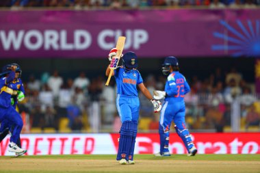Pratika Rawal of India walking towards dressing room after getting caught out by Vishmi Gunarathne of Sri Lanka   during the ICC Women's World Cup India Women v Sri Lanka Women at ACA Barsapara Cricket Stadium, Guwahati, India, 30th September 2025 