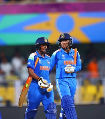Depti Sharma of India and Sneh Rana of India heading towards pavilion after compleating the frist innings during the ICC Women's World Cup India Women v Sri Lanka Women at ACA Barsapara Cricket Stadium, Guwahati, India, 30th September 2025