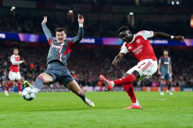 Arsenal 'den Bukayo Saka UEFA Şampiyonlar Ligi karşılaşmasında 2-0 berabere kaldı. 1 Ekim 2025' te Emirates Stadyumu 'nda Arsenal, Olympiakos FC' ye karşı. 