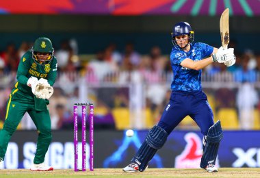 Amy Jones of England batsman hits a four in action during the ICC Women's World Cup match 04 England Women vs South Africa Women at ACA Barsapara Cricket Stadium, Guwahati, Assam / India, 3rd October 2025 