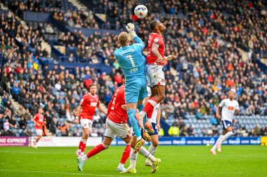 Preston North End 'den Daniel Iversen ve Charlton Athletic takımından Kayne Ramsay, Preston bölgesinde oynanan Sky Bet Şampiyonası maçında Preston North End - Charlton Athletic maçında 4 Ekim 2025' de Deepdale, Preston, İngiltere 'de karşı karşıya geldiler. 