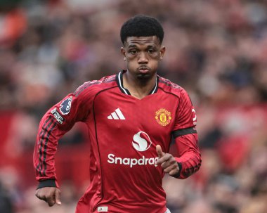 Manchester United 'dan Amad Diallo Premier League maçında Manchester United ile Sunderland maçında Old Trafford, Manchester, İngiltere' de 4 Ekim 2025 'te topu kovalıyor. 