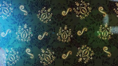 Vadinin çiçekleri gri, mavi ve yeşil renklerde. Çiçekler. Soyut etnik raster çizim kalıbı.