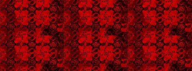 Kırmızı, siyah ve kahverengi renklerde parlak çiçekli halı deseni.