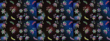 Kumaş desenli papatya çiçeği detayı. Gri, mavi ve siyah renkte çiçekler.