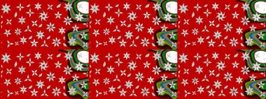 Kırmızı renkte çiçekler. Kumaş desenli papatya çiçekleri ayrıntıları.