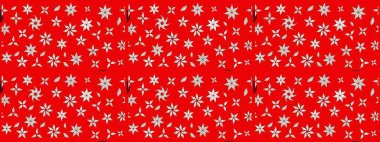 Kumaş desenli papatya çiçeği detayı. Kırmızı renkte çiçekler.