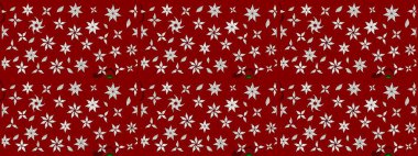 Çiçeksel çizim kalıbının yansıması. Vadinin çiçekleri kırmızı renklerde.