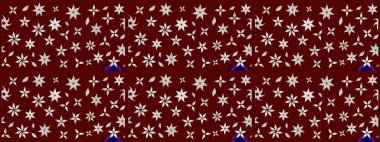 Kumaş desenli papatya çiçeği detayı. Kırmızı ve nötr renkte çiçekler.