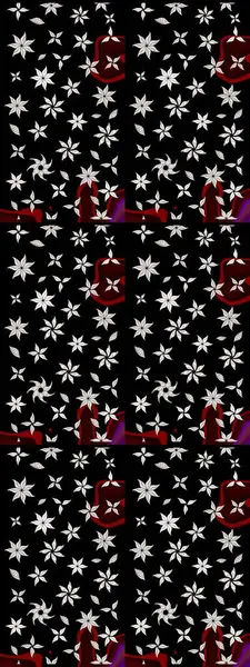 Siyah ve nötr renklerde parlak çiçekli halı deseni.