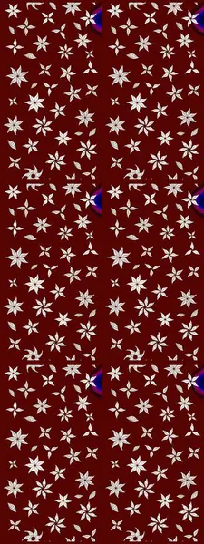 Kumaş desenli papatya çiçeği detayı. Kırmızı ve nötr renkte çiçekler.