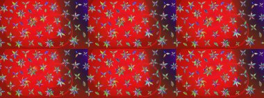 Kumaş desenli papatya çiçeği detayı. Kırmızı ve kahverengi renkte çiçekler.