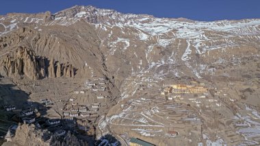Kaza, Himachal, India : Dhankar Gompa (monastery), 1200 year-old architecture in the cold desolate desert mountain valley in Spiti, located very high in the rain shadow region of the Himalayas clipart