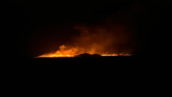 stock image Grindavik, Iceland August 22, 2024. 30 km from the capital Reykjavik, a volcano began to erupt. A new volcanic eruption in Iceland, a 4 km split in the earths crust, tongues of fresh lava