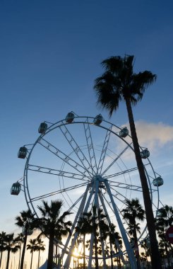 View of giant Ferris wheel at dusk