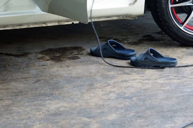 A spray foam car wash on body car to washing.