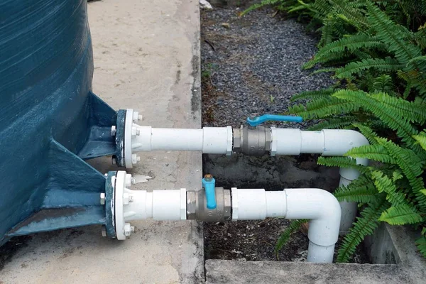 A water supply systems tank with both valve pipe to water supply.