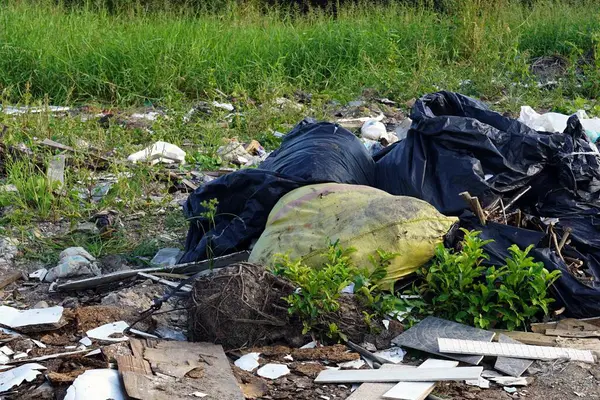 A pile of plastic garbage on the ground, environmental pollution concepts.