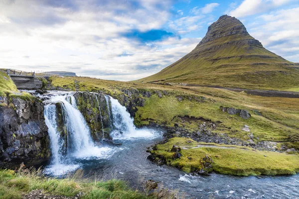 stock image Kirkjufell is a scenic 463 m high hill on the north coast of Icelands Snaefellsnes peninsula. Polular tourist destination. Peaceful and breathtaking