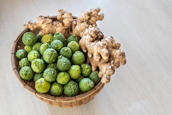 Basket full of kaffir lime and ginger with anti-oxidant and anti-inflammatory properties for well-being