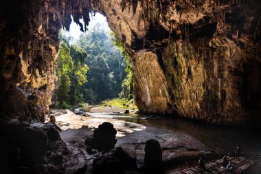 The scenic chamber with river in the Tham Nam Lod cave, popular tourist attraction in Mae Hong Son province, Thailand clipart