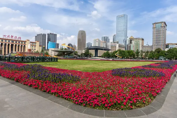 stock image Tianfu Square, the symbol of Chengdu, is located in the city center with pretty garden and surrounded by modern sky scrappers