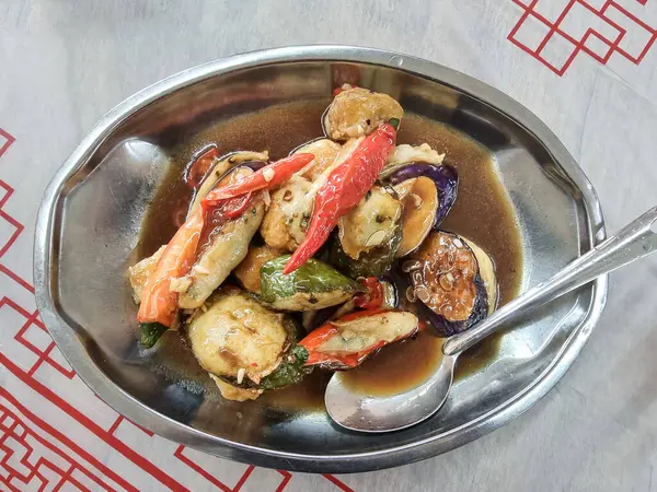 stock image Serving of Hakka Yong Tofu which is stuffed fish paste in vegetables with fermented taucu gravy, popular delicacy in Malaysia.