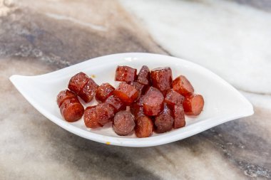 Kızarmış Çin sosisi Teochew lapası çeşitliliğinde Malezya 'da popülerdir.