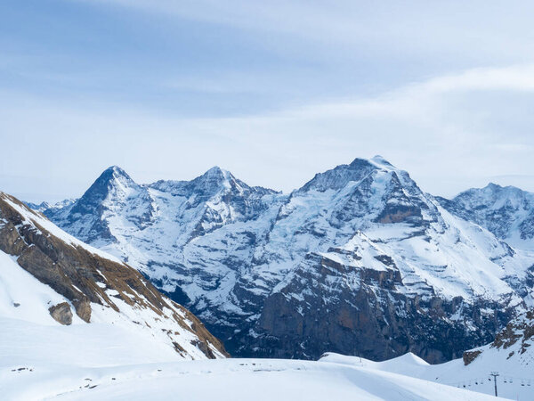 The skiing resort of Muerren, Switzerland, offers amazing views to various high alpine peaks: Jungfrau, Moench, and Eiger.
