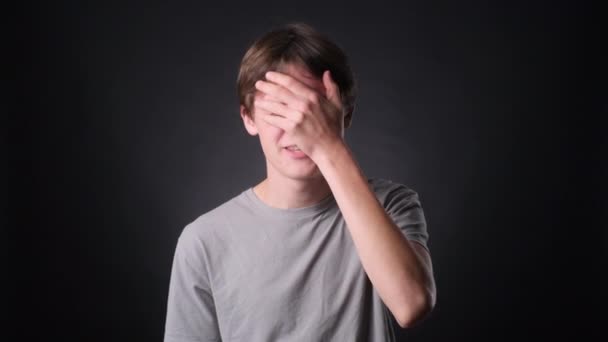 Young Caucasian Man Dressed Casually Expresses Frustration Facepalm Gesture Neutral — Stock Video