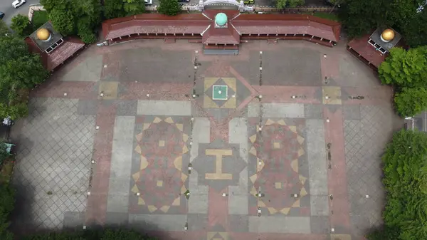 stock image A view of the beautiful field in the middle of the city square by drone, this field is for ceremonies, sports, music concerts, special markets or other events