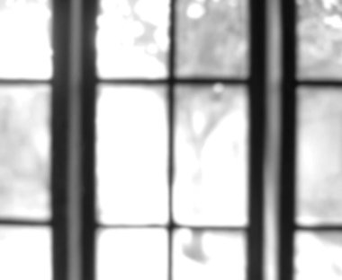 Photo of object framing blurry black and white window glass out of focus, glass out of focus on photo in glass frame at home clipart