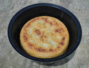 Sihirli com üzerinde sertleşmiş ya da kuru pirinç fotoğrafı, pirinç kuru ve sonra kahverengileşene kadar sertleşir (yanmış pirinç, kabuklu pirinç))