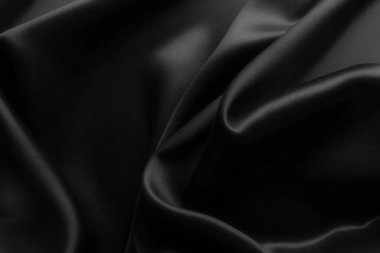 Dalgalı zarif siyah saten ipekten, soyut arkaplan