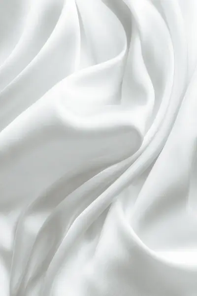 波とエレガントな白いサテンシルク 抽象的な背景 — ストック写真