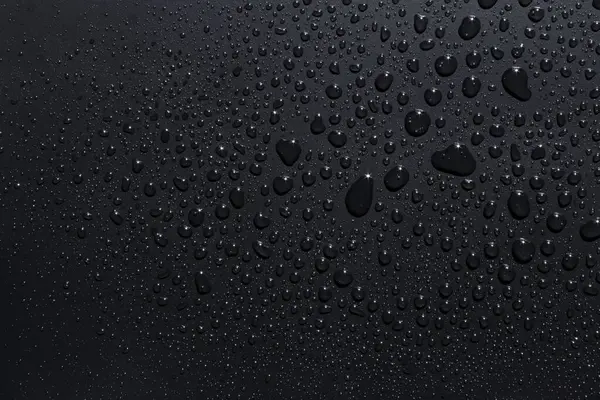 Kaba bir yüzeye su damlaları, doku arkaplanı