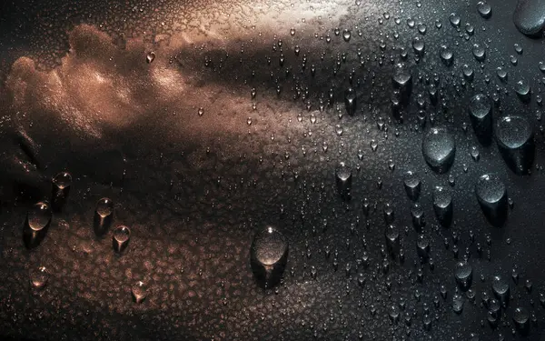 Dalgalı yüzey, yağmur damlaları, doku arkaplanı