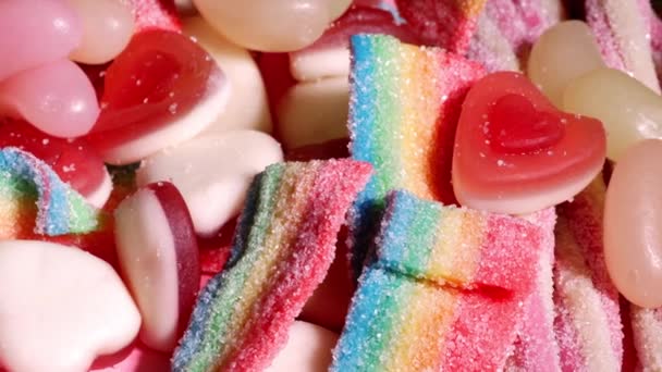 Kolorowy Wybór Cukierków Różowym Tle Lalka Zbliżenie Strzał Selektywny Ostrość — Wideo stockowe