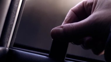 Opening lock on old car door close up slow motion zoom shot selective focus