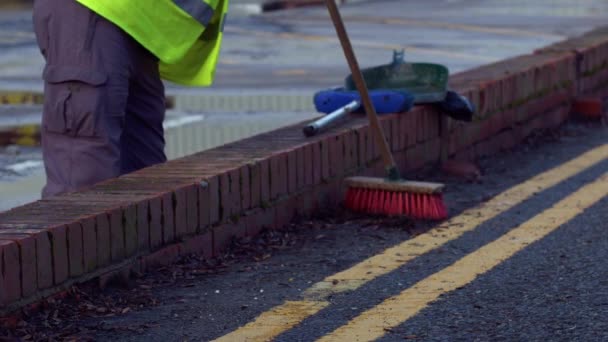 Road Sweeper Using Broom Sweep Road Medium Shot Slow Motion — Vídeos de Stock