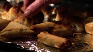 Baking party food in the oven close up 4k slow motion shot selective focus