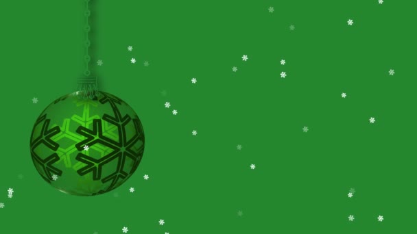 Green Christmas Bauble Decoration Green Background Snowflakes Falling Animation — Vídeo de stock