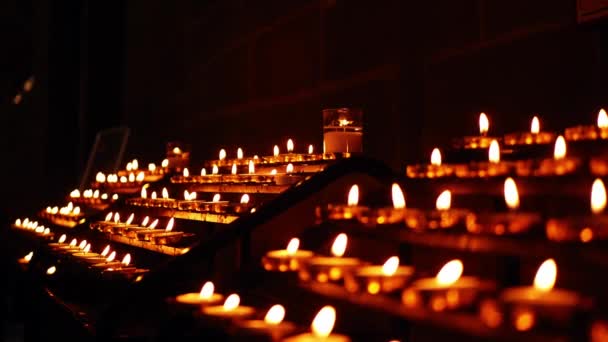 Rows Tea Light Candles Burning Church Wide Slow Motion Shot — Αρχείο Βίντεο