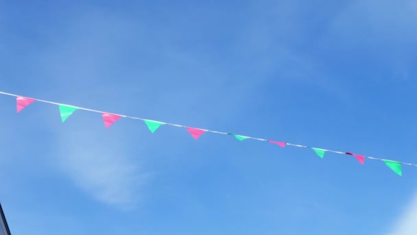 Colorful Bunting Blue Sky Street Party Celebration Wide Zoom Shot — Stock Video