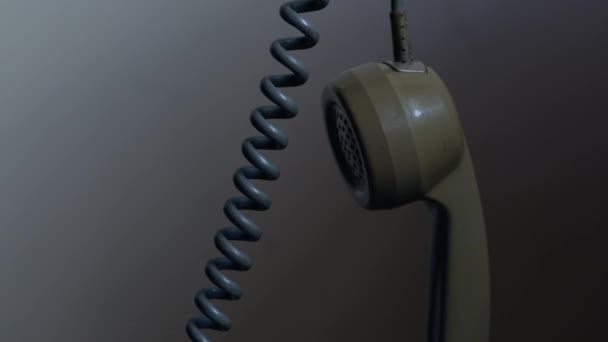 Vintage Rotary Phone Receiver Hanging Close Slow Motion Selective Focus — Stock Video
